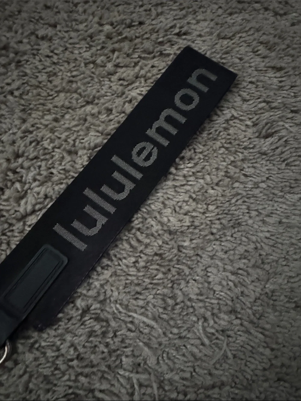 lululemon black branded key strap with silver hardware